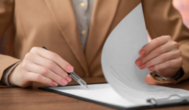 A person signing a contract