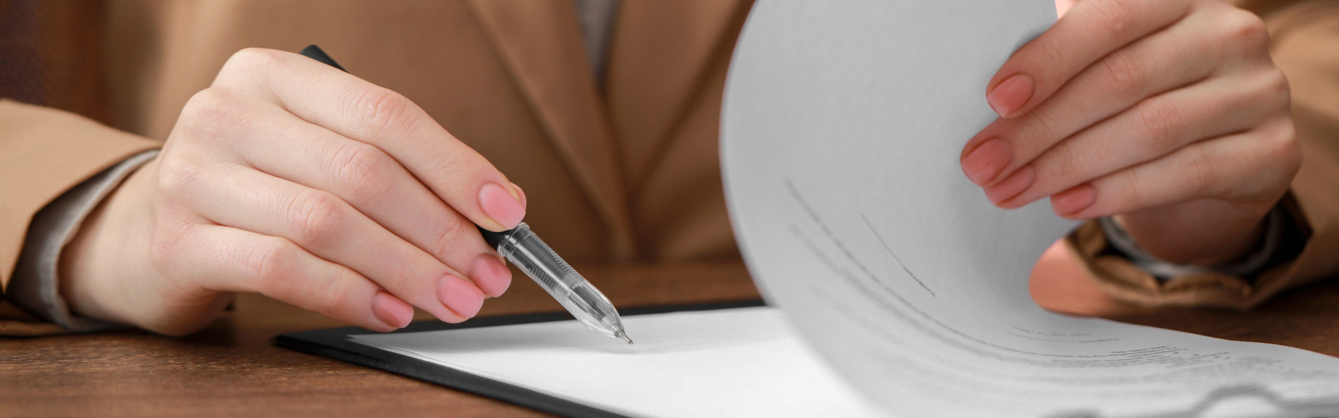 A person signing a contract